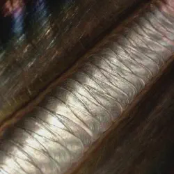 /img/44625-inspecting-welds.webp